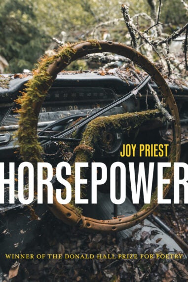 Cover of the book Horsepower includes a vivid photo of a moss-covered steering wheel as seen from behind and looking out at foliage