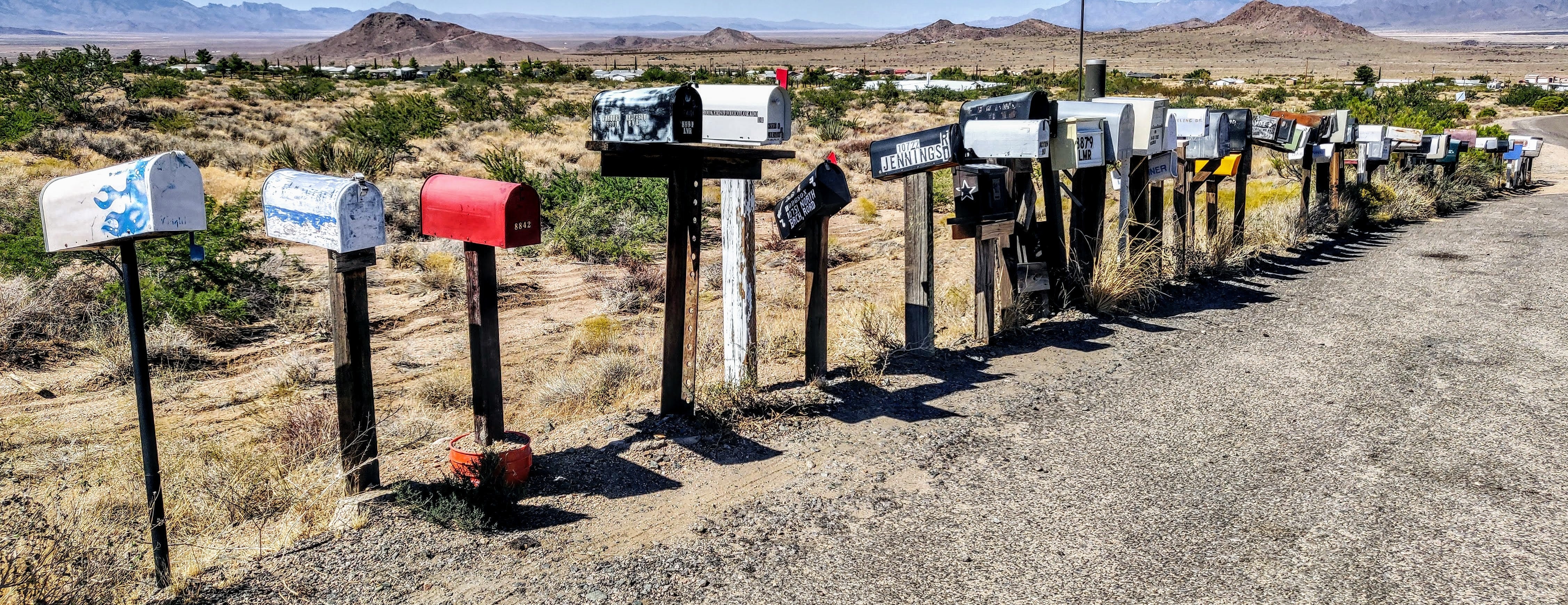 picture of mailboxes along a desert road