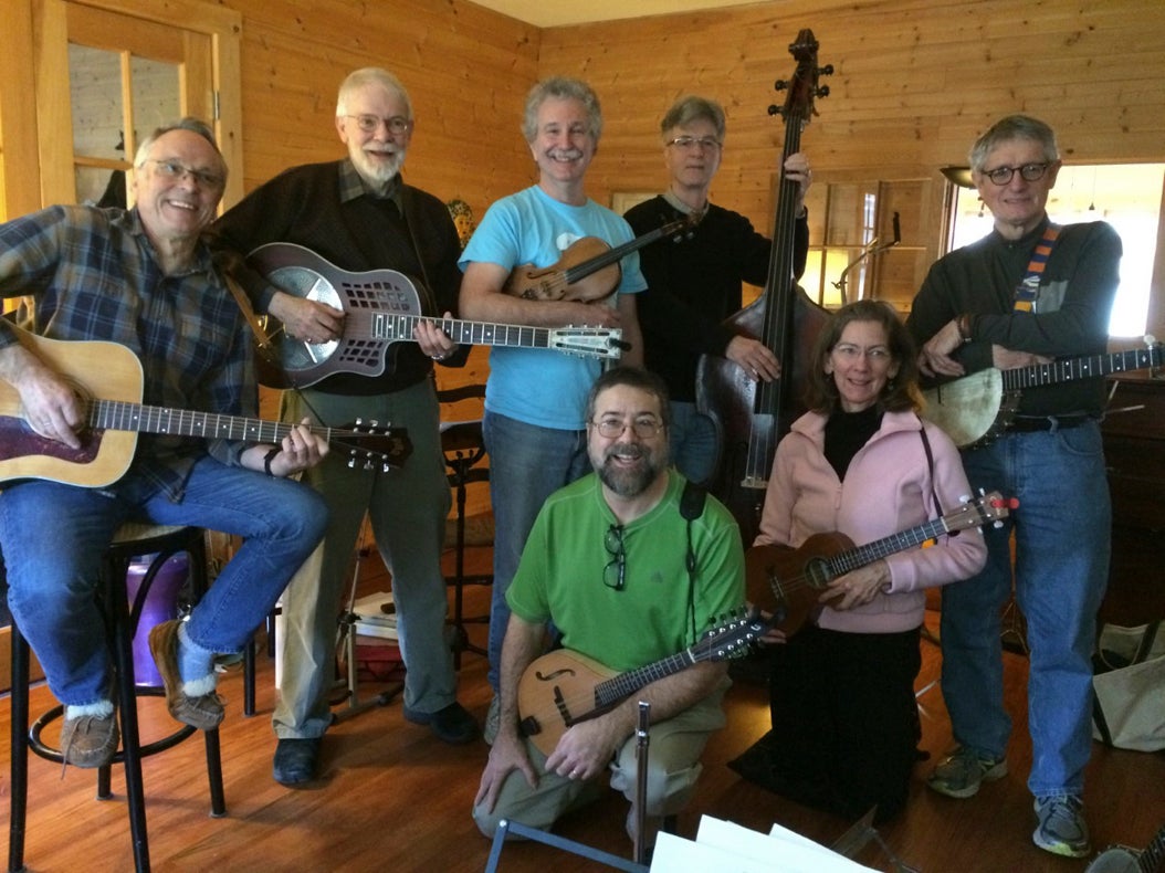 Coles, pictured on left with guitar (Smokestack Lightning, photo)