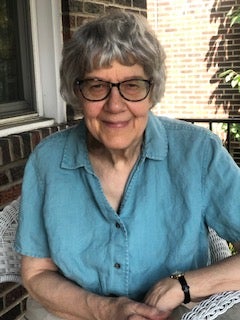 Marianne Novy is a white woman with short gray hair, dark-rimmed glasses